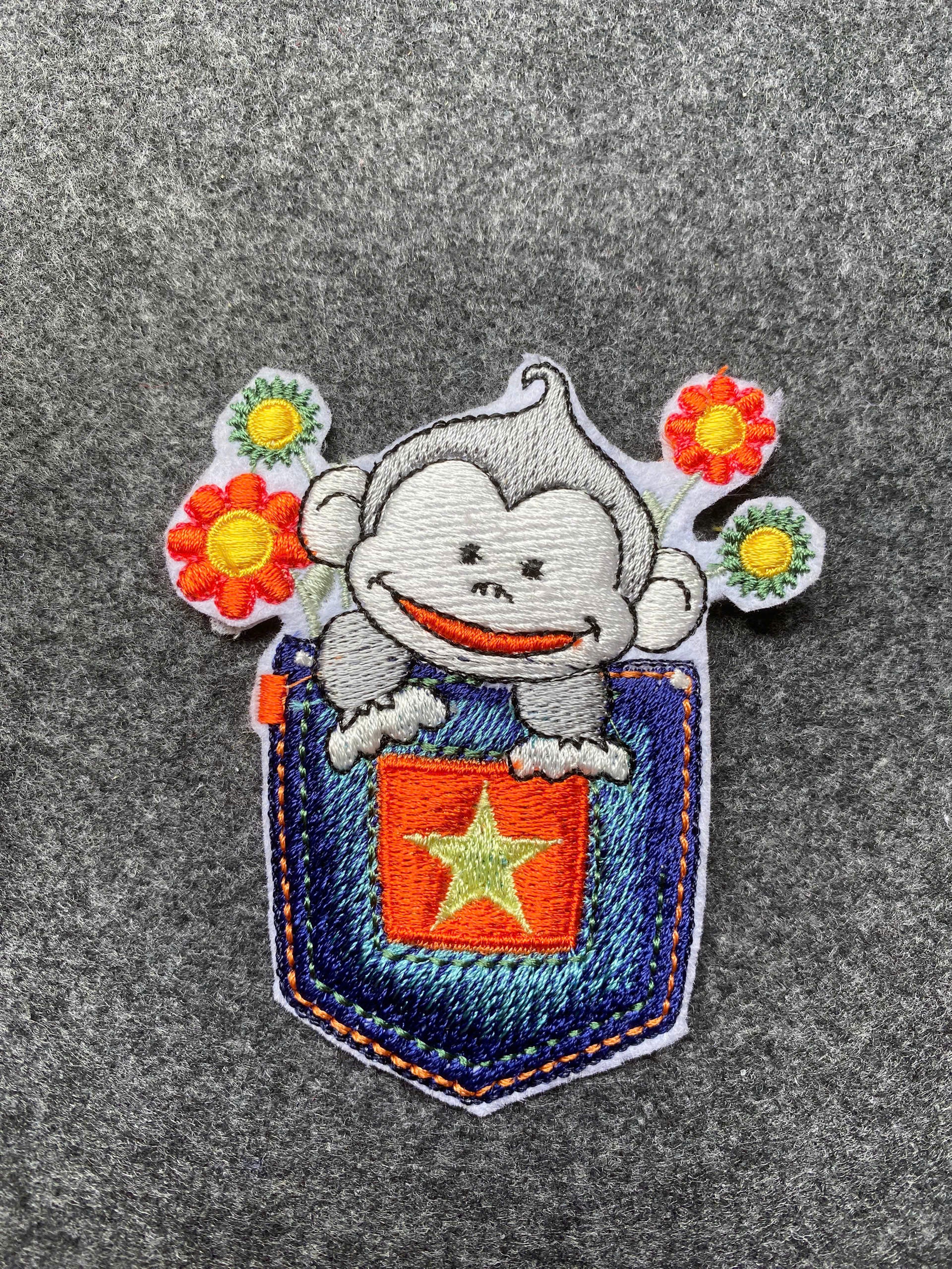 Monkey in Pocket Star Patch - iron-on embroidered patch