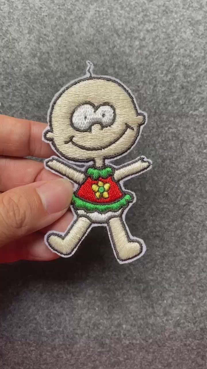 Smiling Baby with Flower Patch